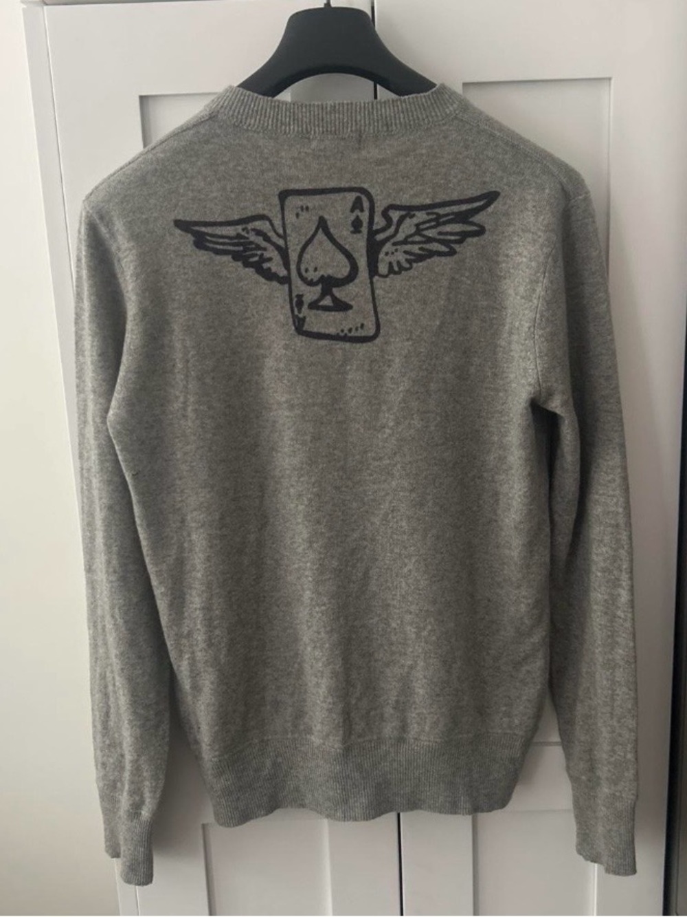 Joie Y2K all cashmere pull over V neck “ace of spades” graphic on back